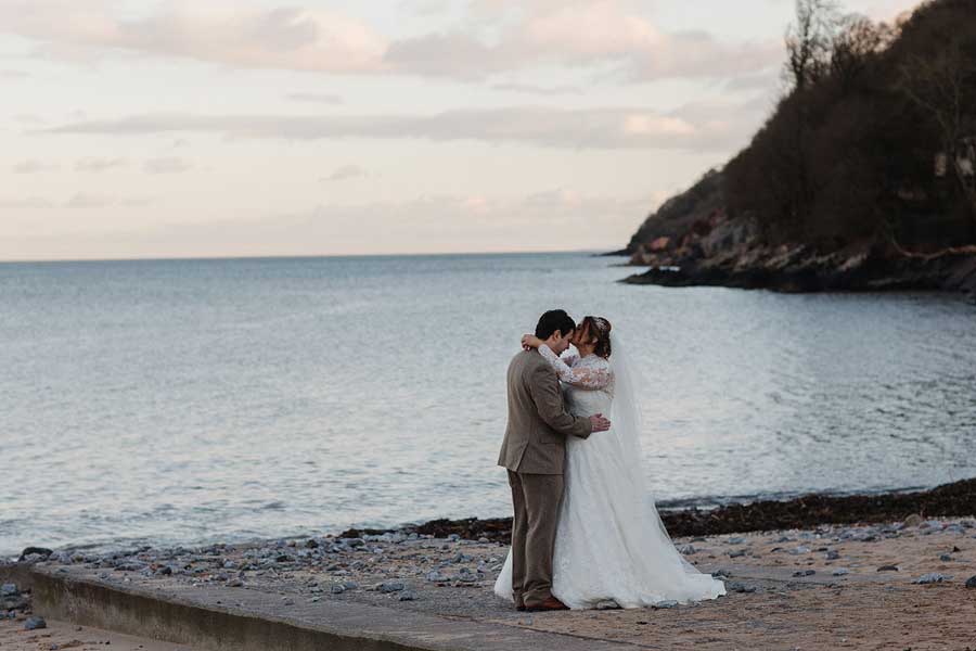 Couples wedding photoshoot at Oxwich Bay beach on the Gower Peninsula