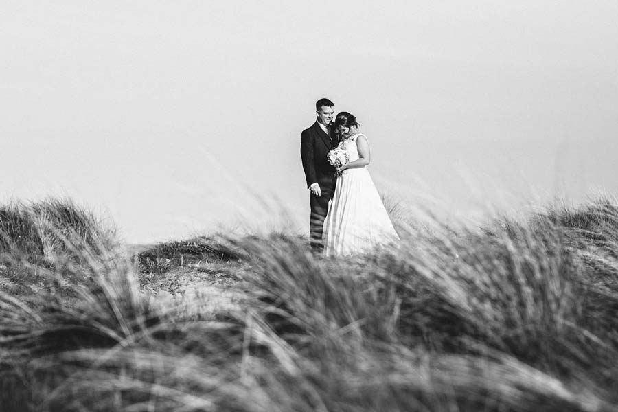 Beach wedding photography by Michelle Huggleston